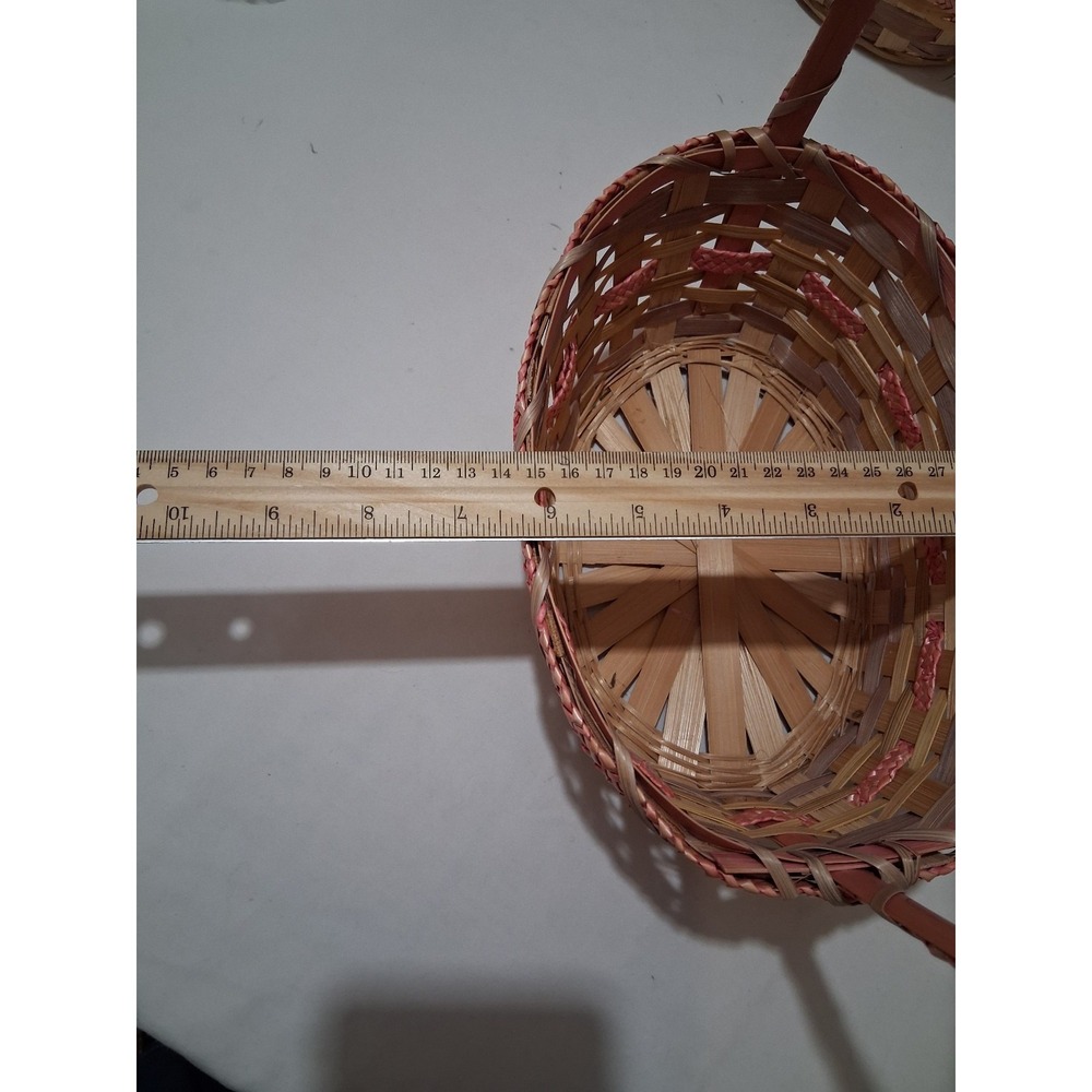 Two vintage woven bamboo baskets with‎ tall handles and pink accenting. - Picture 6 of 9